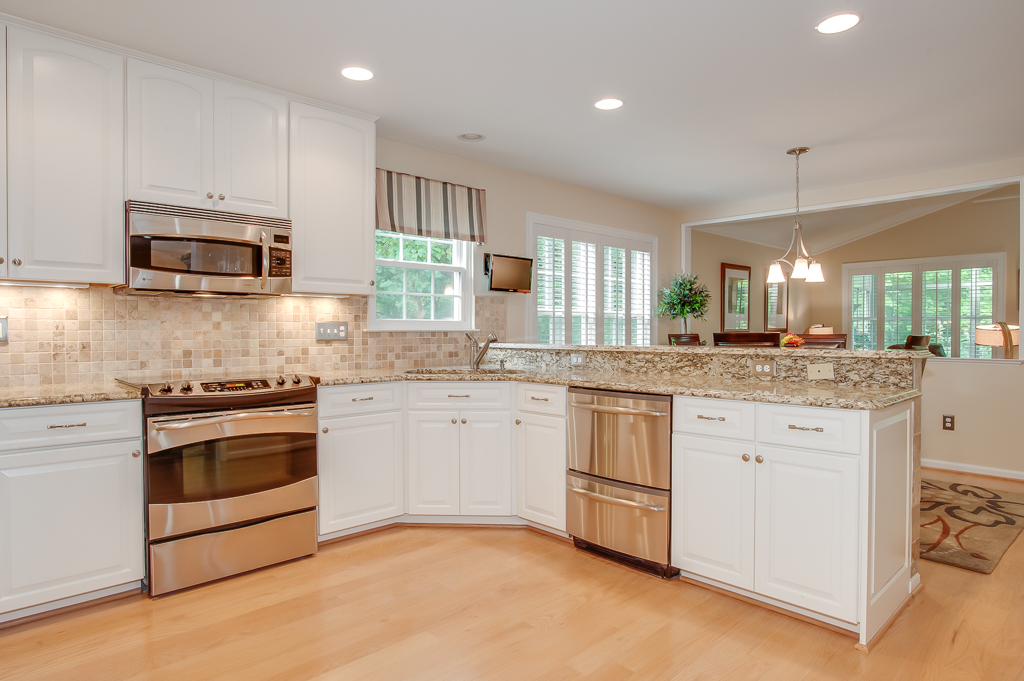 Kitchen with granite counters and stainless steel appliances